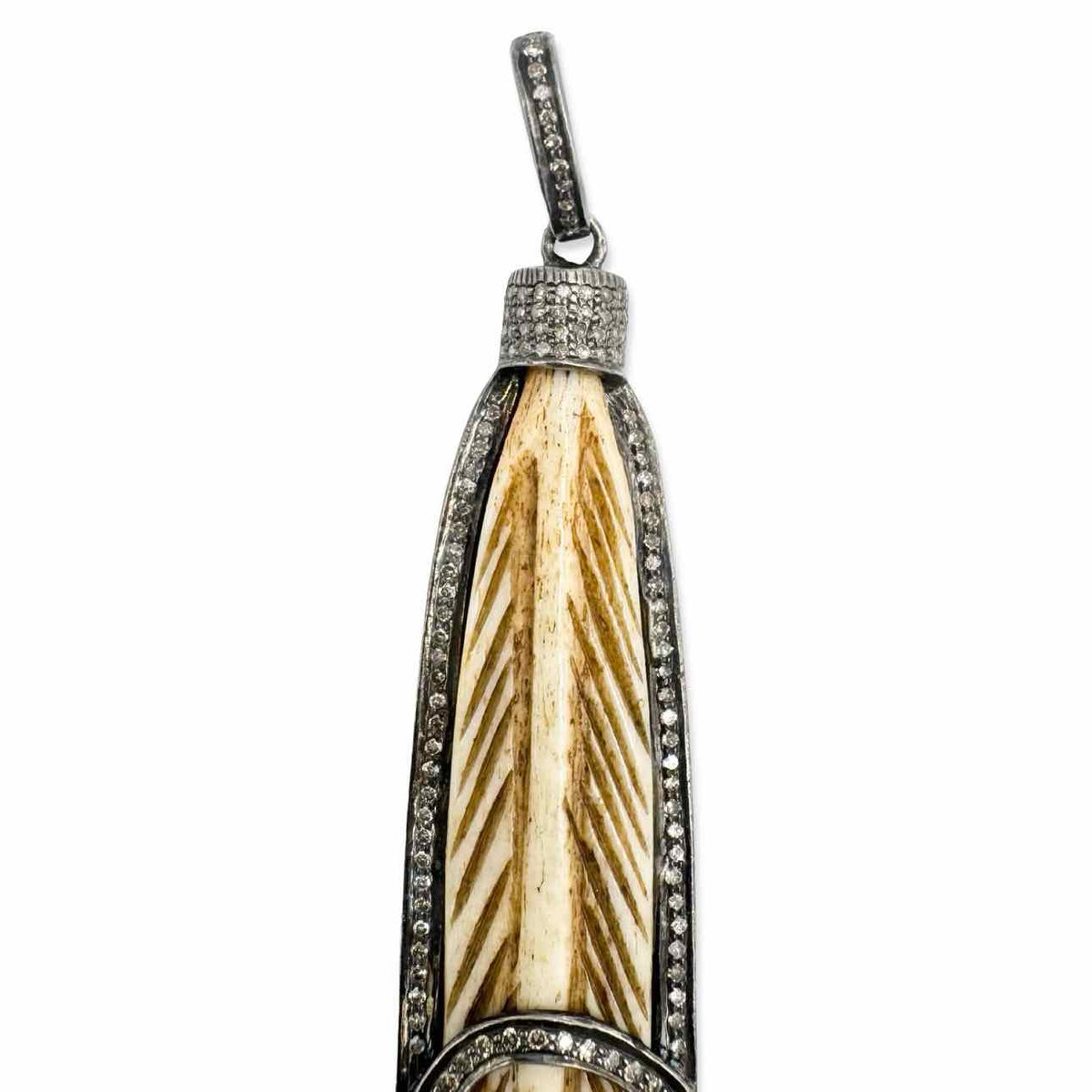 Carved feather pendant with pavé accent