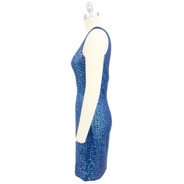 Side view of sleeveless Niteline evening blue dress with sequins, scoop neckline, and above-the-knee hemline.
