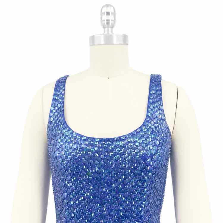Brilliant blue sleeveless sequined dress from Niteline, featuring scoop neckline and shimmering details.
