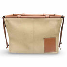 Loewe Cushion Tote handbag in beige canvas with leather trim, stylish and functional accessory for any outfit.